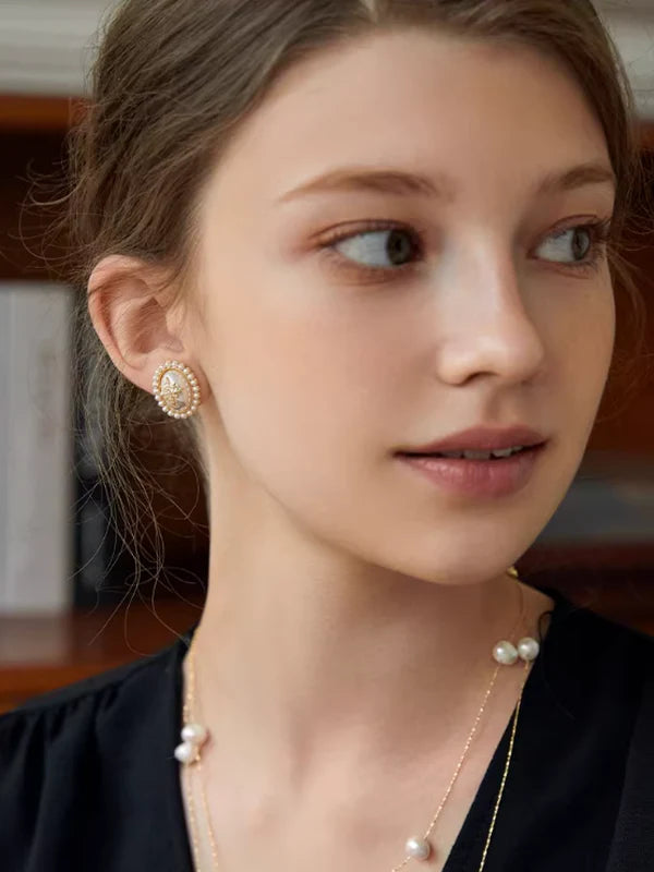 Elliptical Pearl Star Earrings
