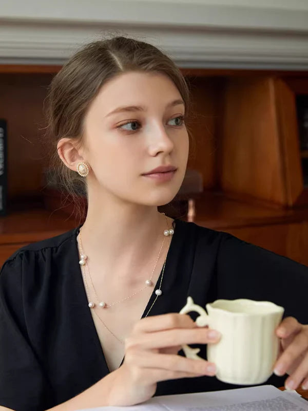 Elliptical Pearl Star Earrings