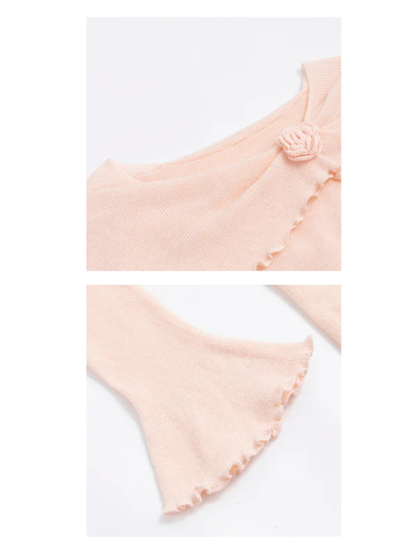 Rosette Charm Asymmetrical Knit Top