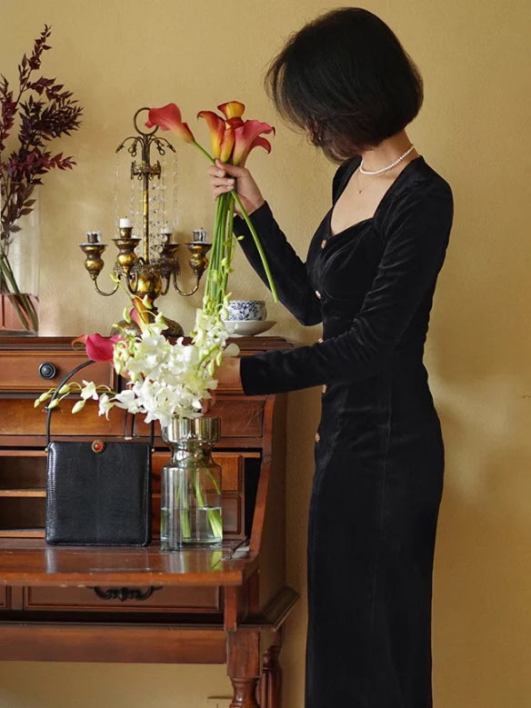 Elegant Black Velvet Dress with Gold Accents