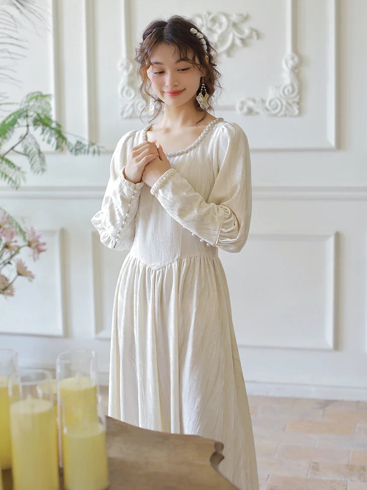 Elegant Pearl-Trimmed Ivory Long Dress