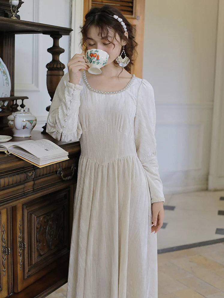 Elegant Pearl-Trimmed Ivory Long Dress