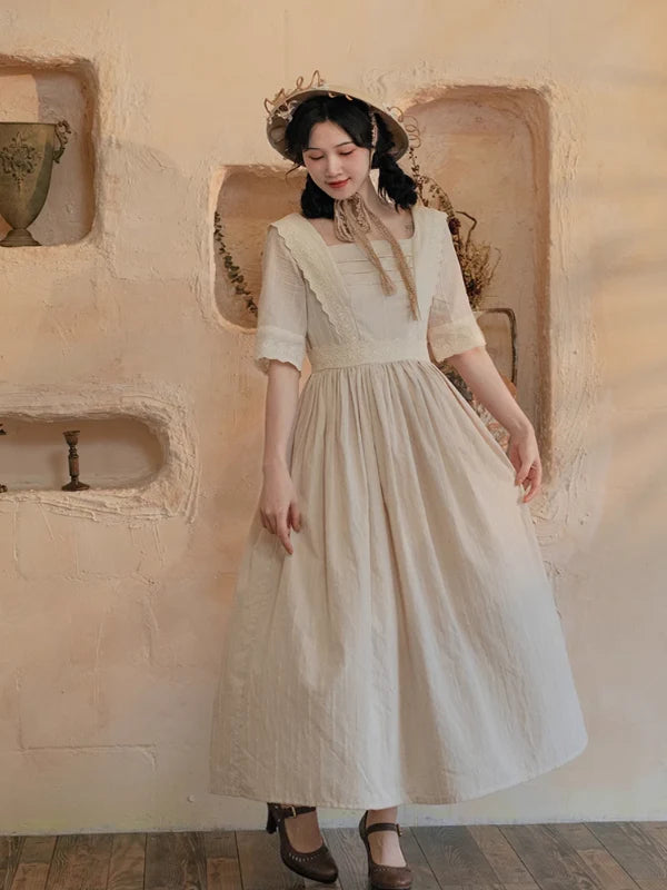 Ivory Elegance Lace-Adorned Dress