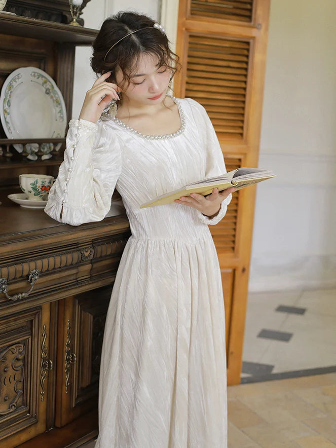 Elegant Pearl-Trimmed Ivory Long Dress