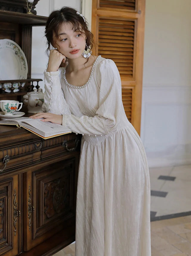 Elegant Pearl-Trimmed Ivory Long Dress