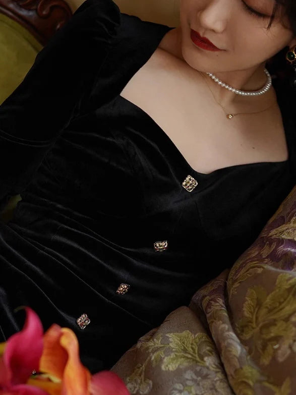 Elegant Black Velvet Dress with Gold Accents