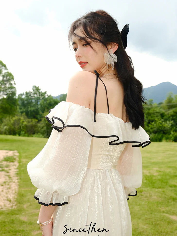 Elara's Graceful Frill White Dress