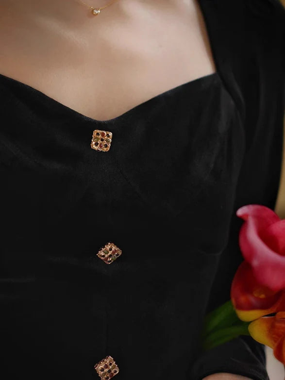 Elegant Black Velvet Dress with Gold Accents